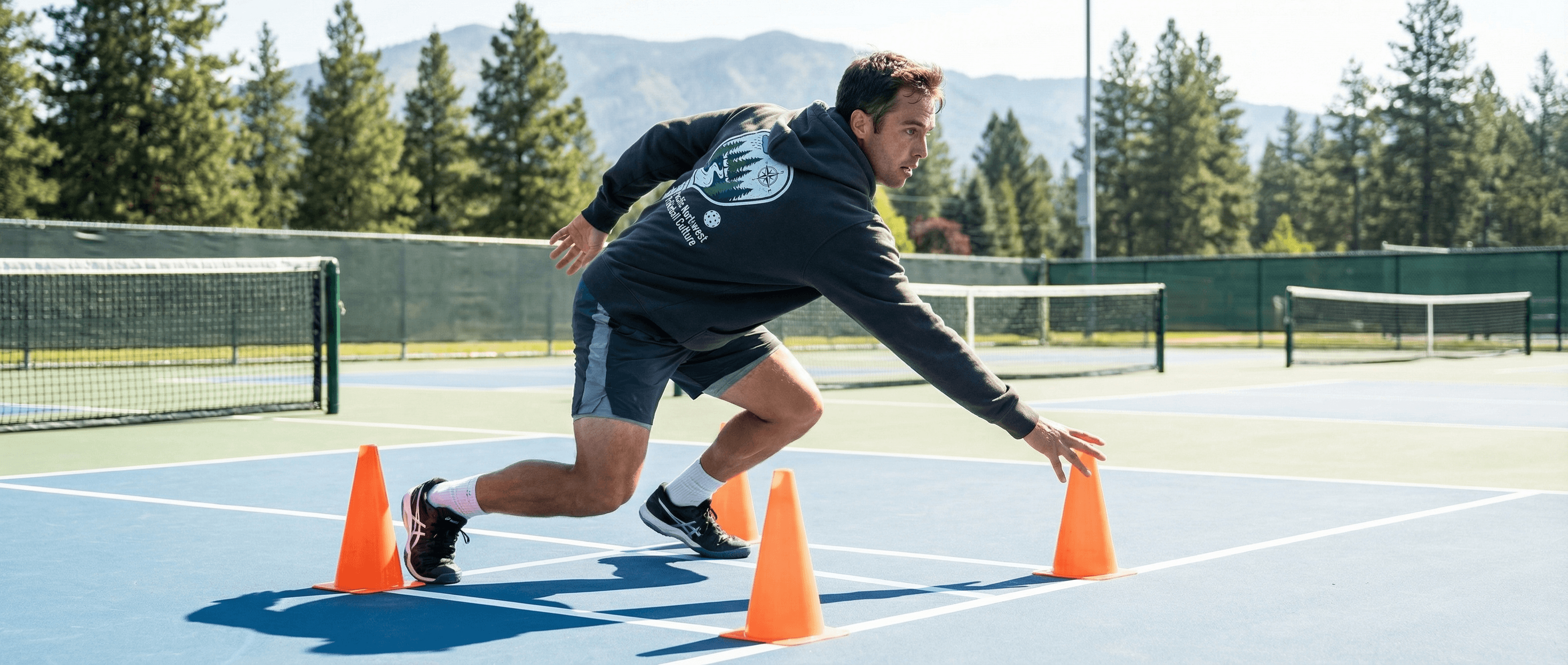 Pickleball player performing agility drills to improve footwork and court movement.