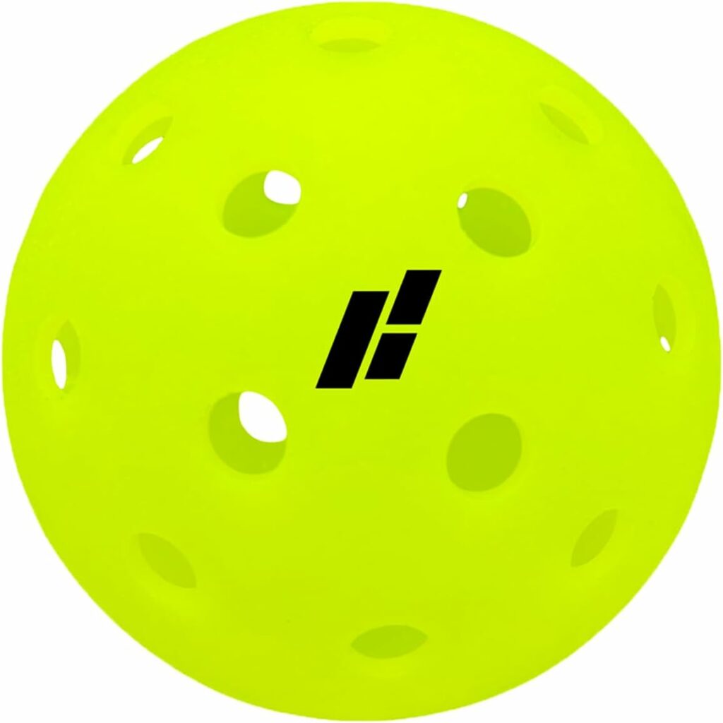 “Close‑up of indoor vs outdoor pickleballs used for performance comparison.”