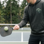 Player demonstrating the perfect dink shot with soft‑touch mechanics at the kitchen line.